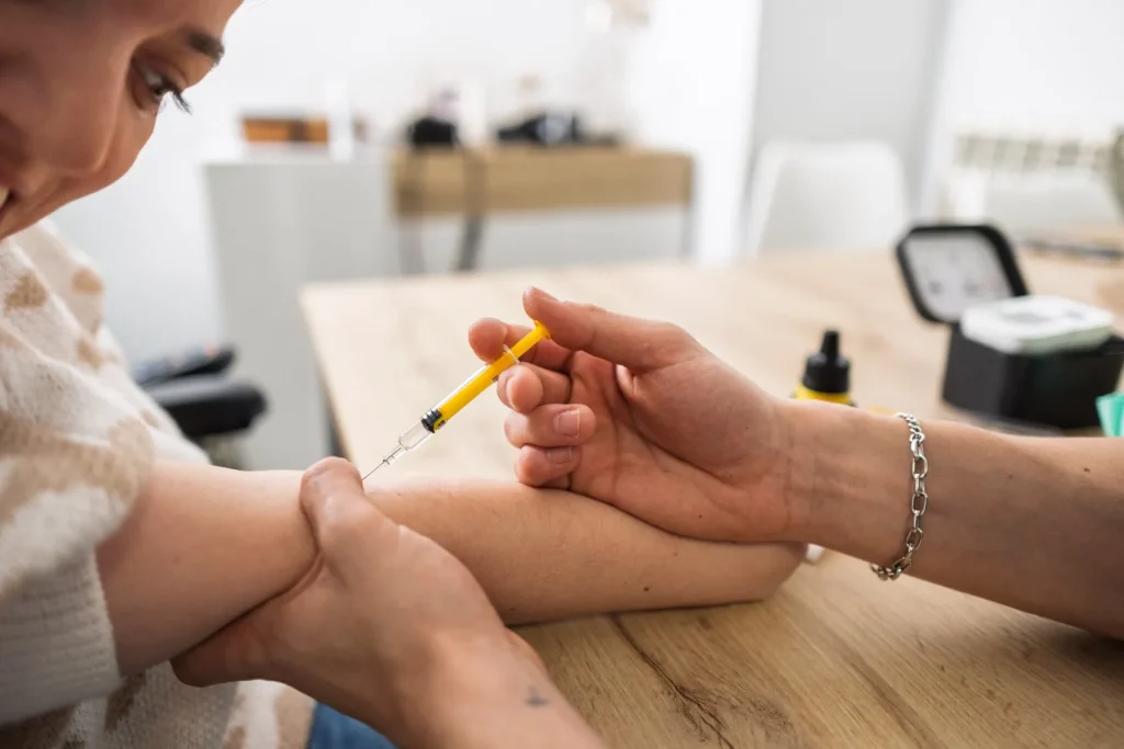 Nurse administering an injection